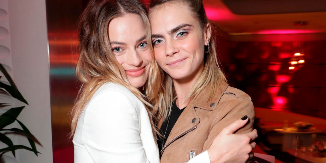 Las imágenes del incidente entre los acompañantes de Margot Robbie y Cara Delevingne con un fotógrafo