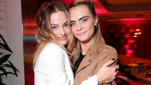 Las imágenes del incidente entre los acompañantes de Margot Robbie y Cara Delevingne con un fotógrafo