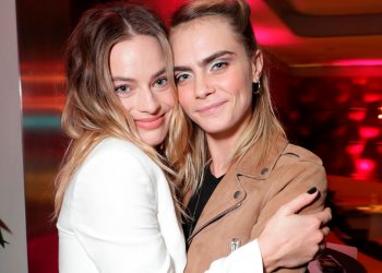 Las imágenes del incidente entre los acompañantes de Margot Robbie y Cara Delevingne con un fotógrafo
